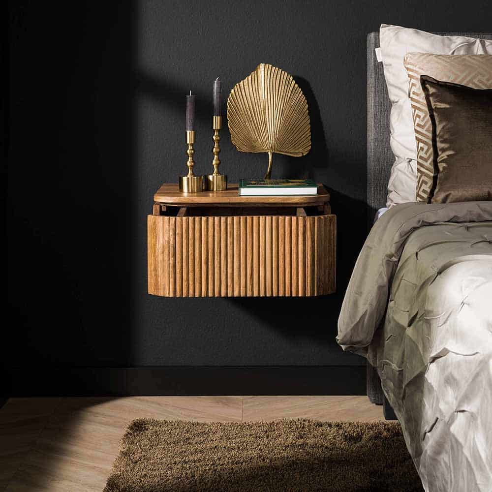 Nachttisch aus robustem Mangoholz mit modernem Design in Wellenform